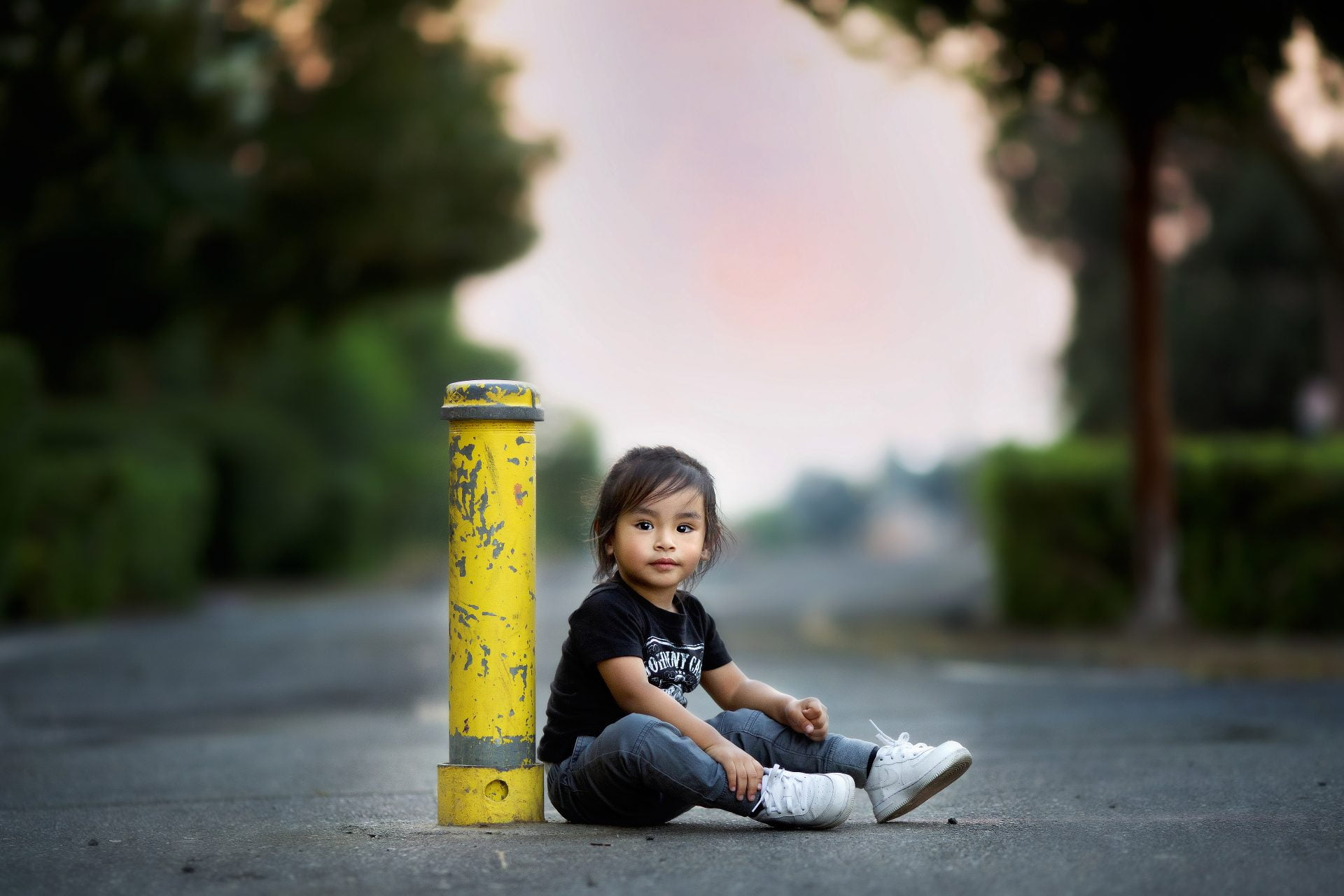 Child sitting by pole Emily Marie Photography in Ripon 