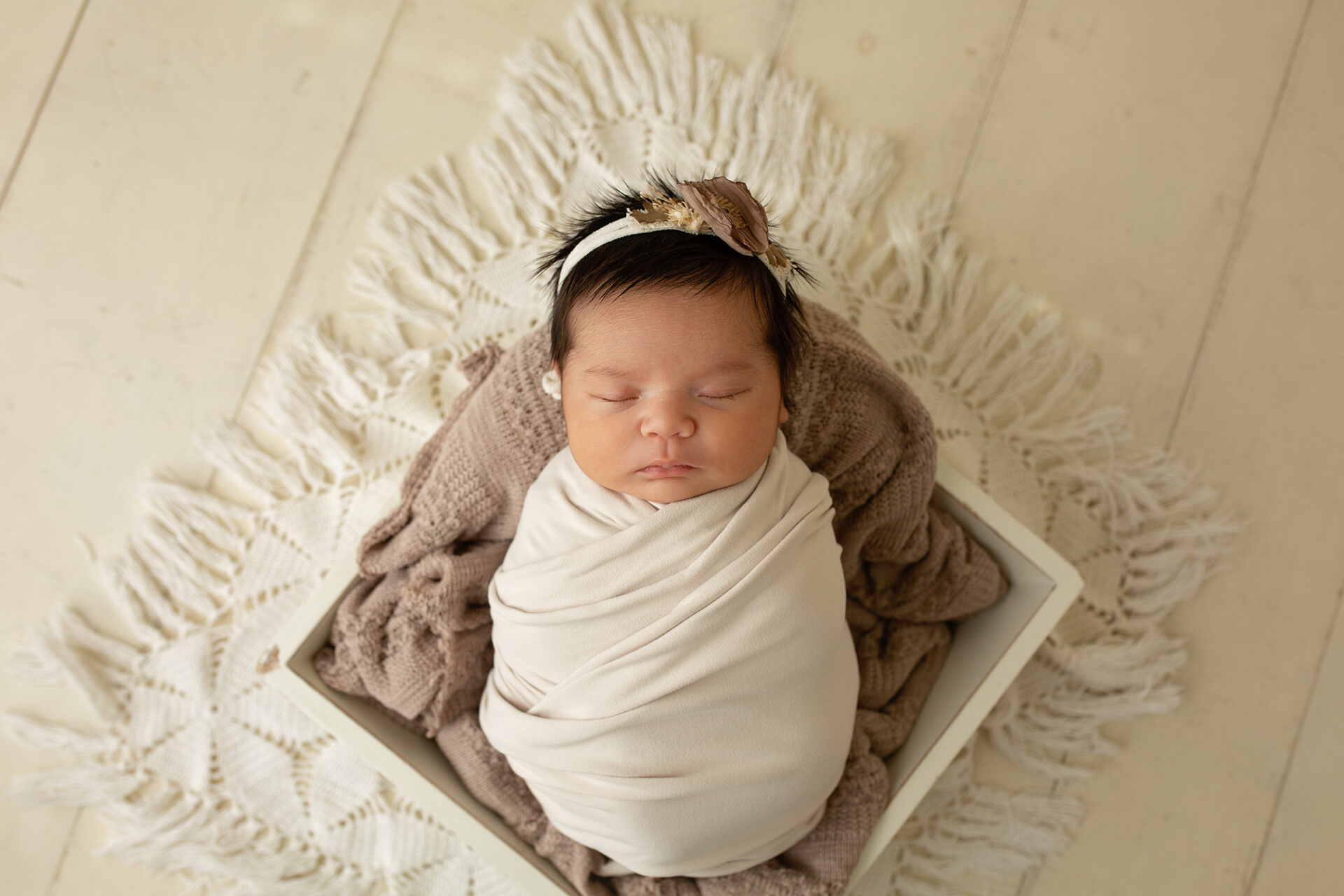 Close up of newborn baby during studio session in Ripon