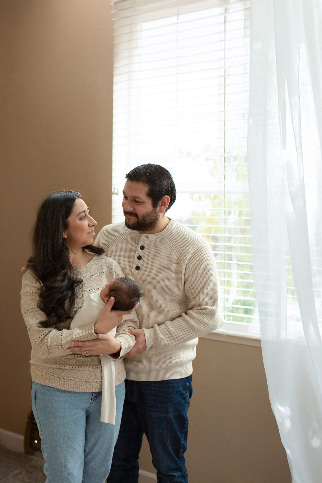 Close up of newborn baby hands during Roseville newborn photography session