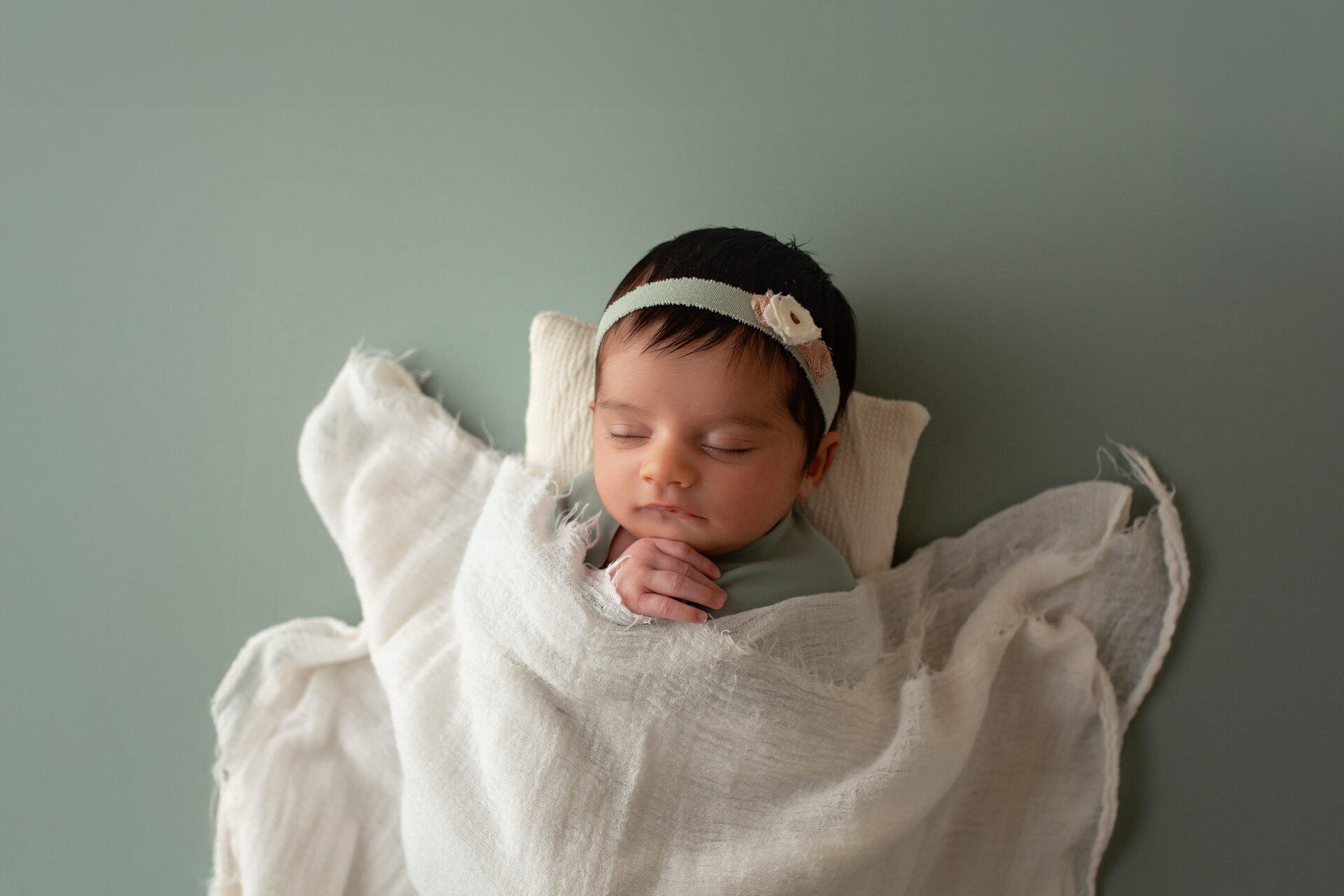 detail shot of newborn baby girl  during manteca session