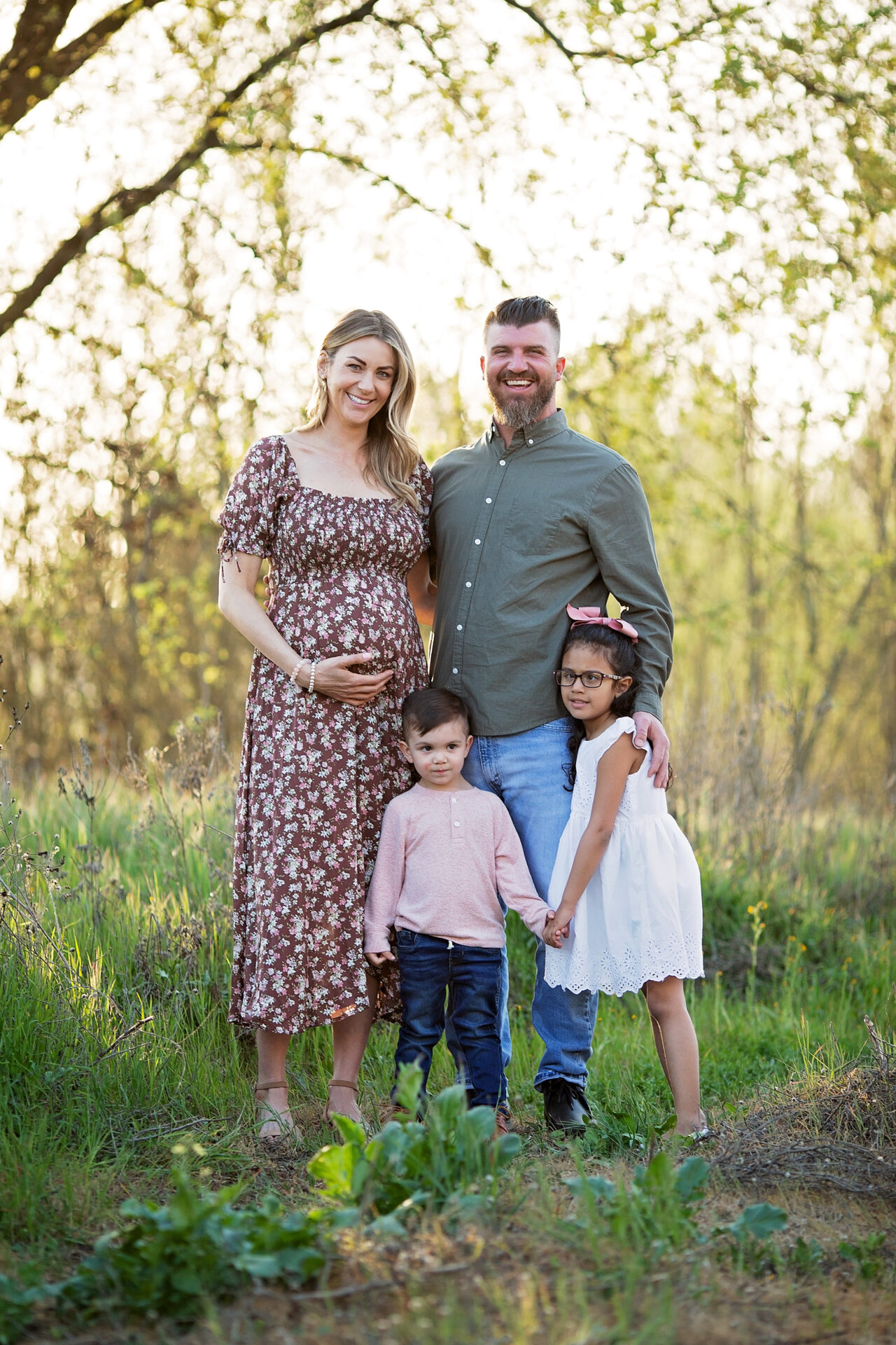 Family outfit coordination for maternity photos Sacramento