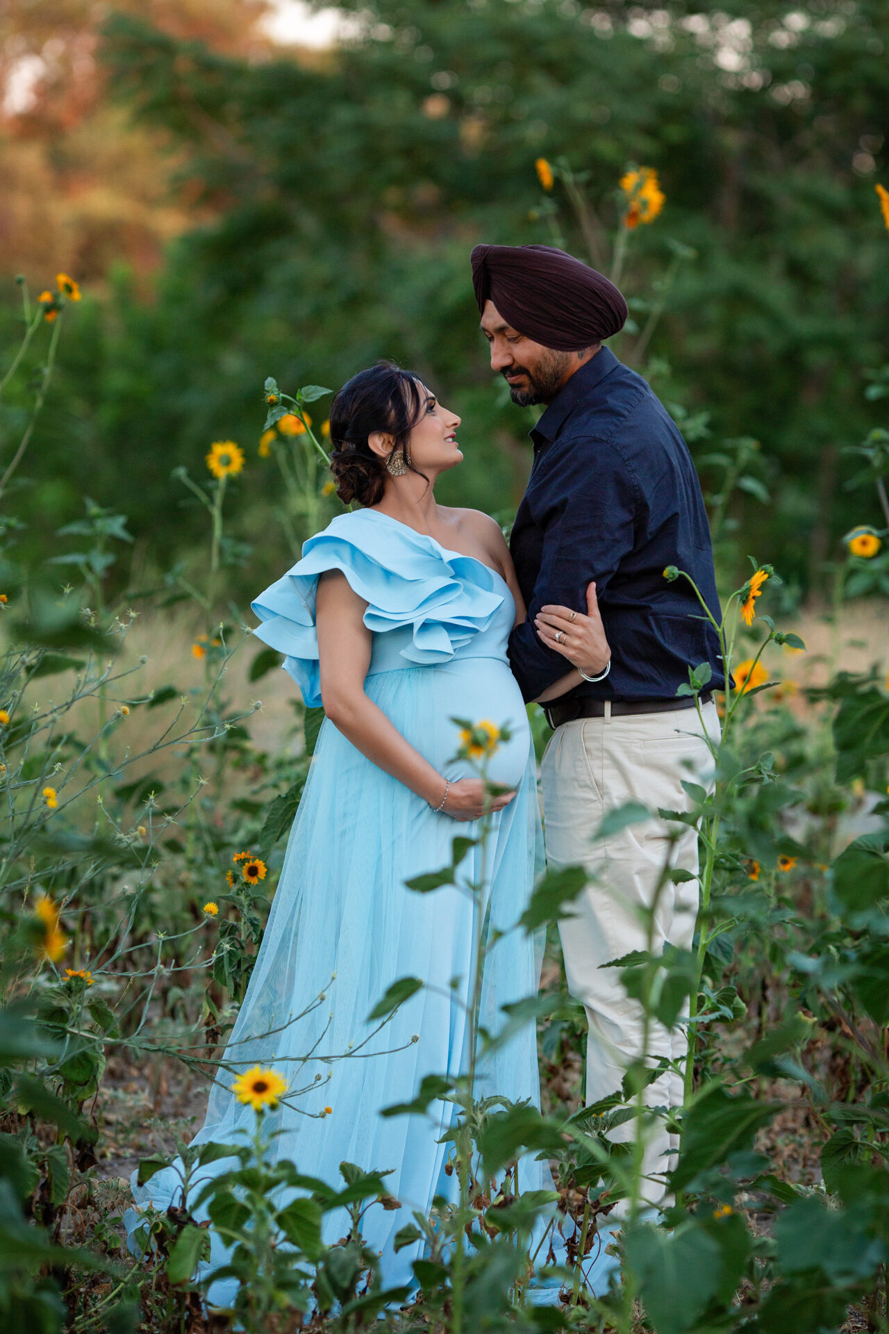 Outdoor maternity portrait of an expecting couple.