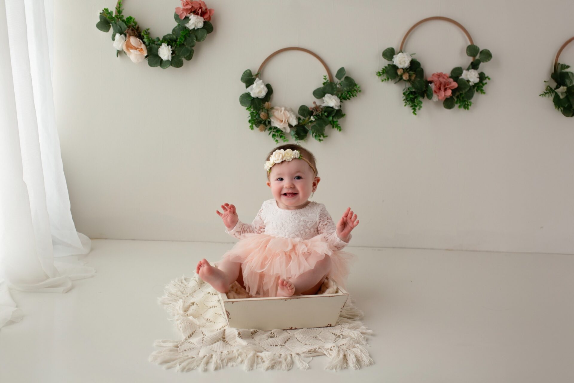First birthday portrait with blush and cream floral hoops